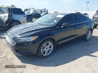2018 Ford Fusion SE z VIN 3FA6P0H74JR125761, wystawiony jako IAAI lot #41992708 z przebiegiem 102 242 mil mil oraz . Historia ofert i sprzedaży dostępna na DreamBid. Obrazek 2.