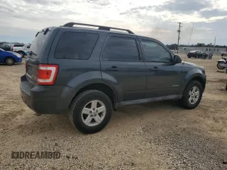 2010 Ford Escape Hybrid with VIN 1FMCU4K35AKC99888, listed as a Copart auction lot 45679595 with 226,824 mi miles and Salvage title. Bid and sale history available at DreamBid. Image 3.