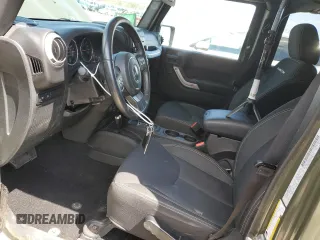 2015 Jeep Wrangler Unlimited Rubicon with VIN 1C4BJWFGXFL752602, listed as a Copart auction lot 54102395 with 26,466 mi miles and Salvage title. Bid and sale history available at DreamBid. Image 7.