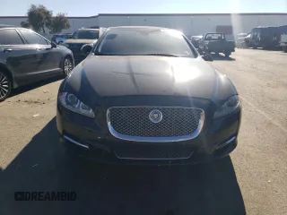 2012 Jaguar XJ with VIN SAJWA1CB7CLV33879, listed as a Copart auction lot 88708995 with Not provided miles and Salvage title. Bid and sale history available at DreamBid. Image 5.