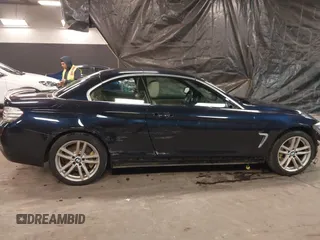 2015 BMW 4 Series 428i xDrive with VIN WBA3T1C59FP820155, listed as a IAAI auction lot 41077810 with 78,029 mi miles and . Bid and sale history available at carsss.com. Image 14.