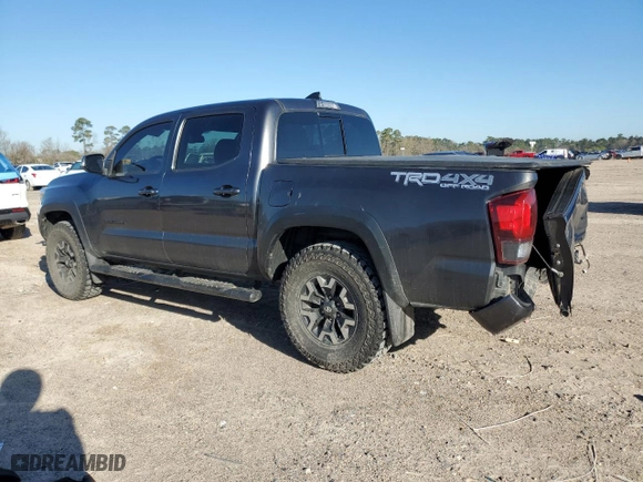 2019 Toyota Tacoma 4WD SR with VIN 3TMCZ5AN7KM287170, listed as a Copart auction lot 48313365 with 75,986 mi miles and Salvage Title. Bid and sale history available at carsss.com. Image 2.