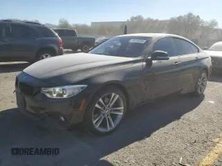 2015 BMW 4 Series 428i z VIN WBA4A9C50FGL86992, wystawiony jako Copart lot #88546355 z przebiegiem 143 407 mil mil oraz Szkoda całkowita • Salvage title. Historia ofert i sprzedaży dostępna na DreamBid. Obrazek 1.
