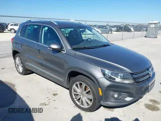 2012 Volkswagen Tiguan SE with VIN WVGBV7AX5CW005643, listed as a IAAI auction lot 41659121 with 144,741 mi miles and . Bid and sale history available at DreamBid. Image 1.