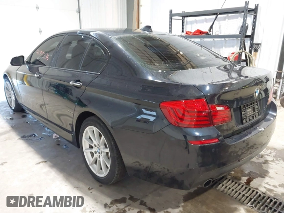 2014 BMW 5 Series 535i xDrive with VIN WBA5B3C58ED531825, listed as a IAAI auction lot 41715275 with 67,782 mi miles and . Bid and sale history available at carsss.com. Image 3.