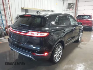 2015 Lincoln MKC with VIN 5LMCJ1A98FUJ10348, listed as a IAAI auction lot 41566416 with 133,035 mi miles and . Bid and sale history available at DreamBid. Image 4.