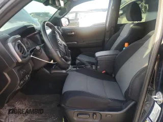 2023 Toyota Tacoma 4WD SR with VIN 3TYCZ5AN0PT110522, listed as a Copart auction lot 82789424 with 45,115 mi miles and Salvage Title. Bid and sale history available at carsss.com. Image 7.