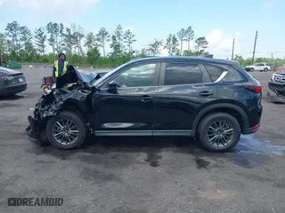 2019 Mazda CX-5 Touring with VIN JM3KFACM6K0672294, listed as a IAAI auction lot 42003210 with 50,127 mi miles. Bid and sale history available at carsss.com. Image 13.