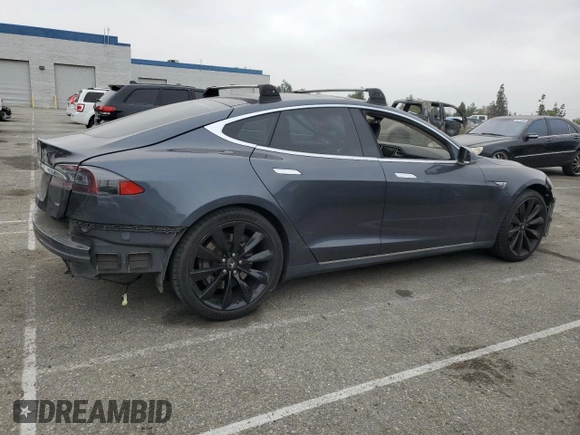 2014 Tesla Model S 60 with VIN 5YJSA1S14EFP56277, listed as a Copart auction lot 57162685 with Not provided miles and Salvage title. Bid and sale history available at DreamBid. Image 3.