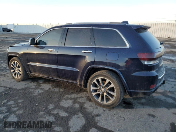2017 Jeep Grand Cherokee Overland with VIN 1C4RJFCT0HC952052, listed as a Copart auction lot 85064124 with 184,206 mi miles and Salvage Title. Bid and sale history available at carsss.com. Image 2.