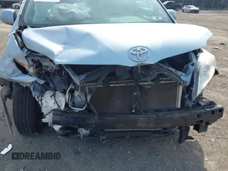 2016 Toyota Sienna LE AAS with VIN 5TDKK3DC4GS701298, listed as a IAAI auction lot 42115591 with 94,729 mi miles and . Bid and sale history available at DreamBid. Image 6.