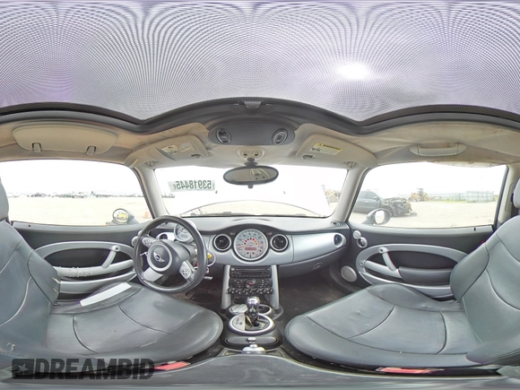 2005 MINI Hardtop with VIN WMWRC335X5TJ70165, listed as a Copart auction lot 53918445 with 145,572 mi miles and Salvage title. Bid and sale history available at DreamBid. Image 14.
