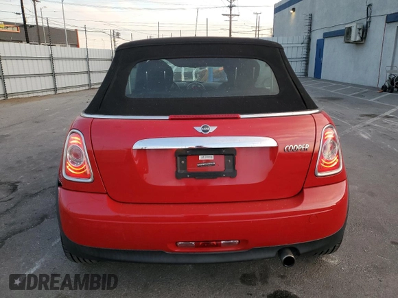 2015 MINI Convertible with VIN WMWZN3C59FT862963, listed as a Copart auction lot 86016514 with 96,493 mi miles and Salvage title. Bid and sale history available at DreamBid. Image 6.
