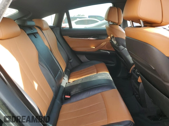 2015 BMW X6 xDrive50i with VIN 5UXKU6C56F0F93641, listed as a Copart auction lot 77233553 with 71,409 mi miles. Bid and sale history available at carsss.com. Image 11.