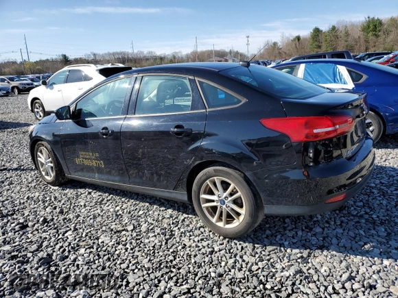 2018 Ford Focus SE with VIN 1FADP3FE9JL306394, listed as a Copart auction lot 52902175 with 77,338 mi miles and Salvage title. Bid and sale history available at DreamBid. Image 2.
