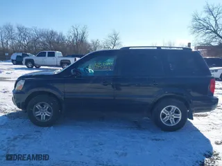 2004 Honda Pilot EX with VIN 2HKYF18544H574133, listed as a IAAI auction lot 41415703 with 217,539 mi miles. Bid and sale history available at carsss.com. Image 14.