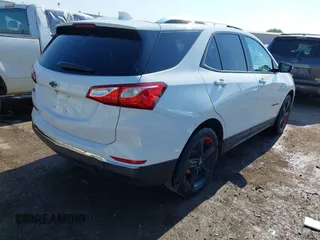 2021 Chevrolet Equinox Premier z VIN 2GNAXNEV9M6120241, wystawiony jako IAAI lot #42222928 z przebiegiem 104 274 mil mil oraz . Historia ofert i sprzedaży dostępna na DreamBid. Obrazek 4.