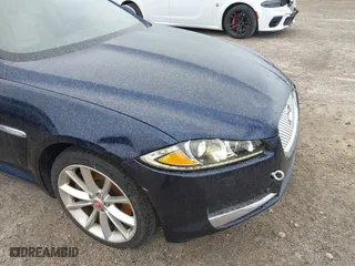 2015 Jaguar XF V6 Portfolio with VIN SAJWJ0FF5F8U67140, listed as a IAAI auction lot 41967522 with 68,000 mi miles. Bid and sale history available at carsss.com. Image 6.