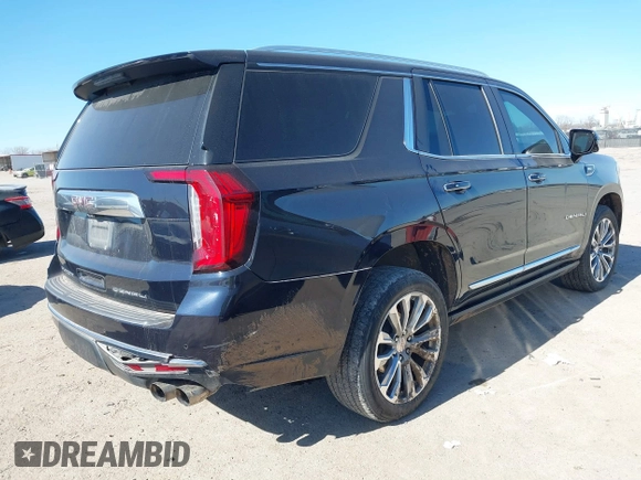 2021 GMC Yukon Denali with VIN 1GKS2DKL1MR135771, listed as a IAAI auction lot 41403680 with 61,772 mi miles. Bid and sale history available at carsss.com. Image 4.