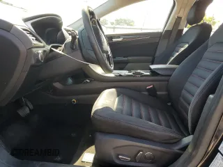 2015 Ford Fusion SE z VIN 1FA6P0HDXF5103053, wystawiony jako Copart lot #57763875 z przebiegiem 121 789 mil mil oraz Szkoda całkowita • Salvage title. Historia ofert i sprzedaży dostępna na DreamBid. Obrazek 7.