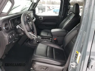 2024 Jeep Wrangler Rubicon with VIN 1C4RJXR66RW237347, listed as a Copart auction lot 88774995 with 18,018 mi miles and Salvage Title. Bid and sale history available at DreamBid. Image 7.