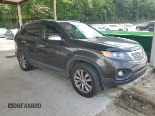 2011 Kia Sorento EX with VIN 5XYKU3A11BG134695, listed as a Copart auction lot 60104135 with 227,552 mi miles and Salvage title. Bid and sale history available at DreamBid. Image 4.