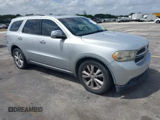 2011 Dodge Durango Crew with VIN 1D4RD4GGXBC598205, listed as a IAAI auction lot 41908965 with 182,875 mi miles and . Bid and sale history available at carsss.com. Image 1.