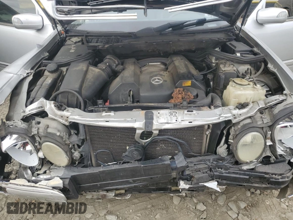 2001 Mercedes-Benz E-Class with VIN WDBJF65J71B201020, listed as a Copart auction lot 76067154 with 328,629 mi miles and Salvage Title. Bid and sale history available at carsss.com. Image 13.