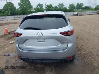 2021 Mazda CX-5 Grand Touring with VIN JM3KFBDM4M0371496, listed as a IAAI auction lot 42428860 with 113,735 mi miles and . Bid and sale history available at DreamBid. Image 17.