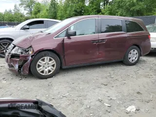 2011 Honda Odyssey LX z VIN 5FNRL5H29BB057920, wystawiony jako Copart lot #56433905 z przebiegiem 143 551 mil mil oraz Szkoda całkowita • Salvage title. Historia ofert i sprzedaży dostępna na DreamBid. Obrazek 1.