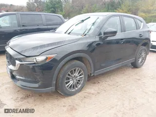 2017 Mazda CX-5 Sport with VIN JM3KFBBL5H0201857, listed as a IAAI auction lot 40885161 with 87,464 mi miles. Bid and sale history available at carsss.com. Image 19.