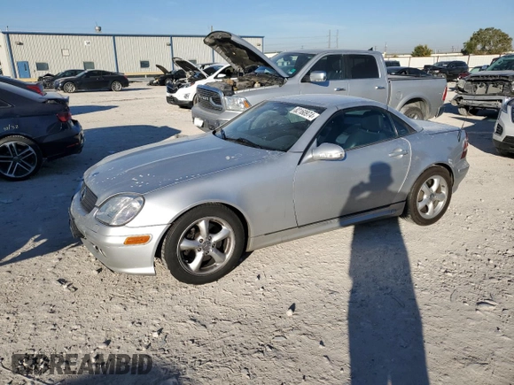 2004 Mercedes-Benz SLK-Class with VIN WDBKK65FX4F300214, listed as a Copart auction lot 82160974 with 75,964 mi miles and Salvage Title. Bid and sale history available at carsss.com. Image 1.