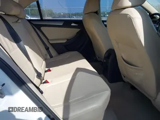 2015 Volkswagen Jetta SE z VIN 3VWD17AJXFM327152, wystawiony jako IAAI lot #42055458 z przebiegiem 69 412 mil mil oraz . Historia ofert i sprzedaży dostępna na DreamBid. Obrazek 8.