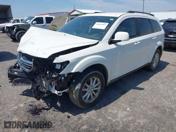 2013 Dodge Journey SXT with VIN 3C4PDCBG0DT701712, listed as a IAAI auction lot 42015263 with 92,533 mi miles. Bid and sale history available at carsss.com. Image 2.