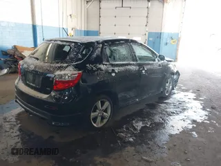 2009 Toyota Matrix S with VIN 2T1LE40E39C004676, listed as a IAAI auction lot 41366470 with 146,316 mi miles. Bid and sale history available at carsss.com. Image 4.