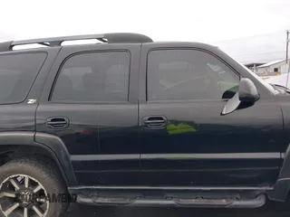 2004 Chevrolet Tahoe Z71 with VIN 1GNEK13T64R210008, listed as a IAAI auction lot 41641964 with 196,780 mi miles and . Bid and sale history available at DreamBid. Image 14.
