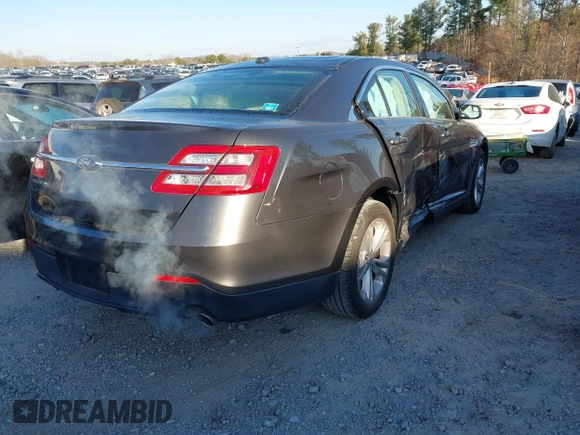 2017 Ford Taurus SE with VIN 1FAHP2D8XHG115594, listed as a IAAI auction lot 41237325 with 77,945 mi miles and . Bid and sale history available at DreamBid. Image 4.