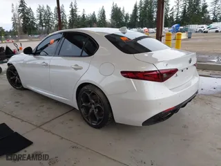 2018 Alfa Romeo Giulia Ti with VIN ZARFAECNXJ7574745, listed as a IAAI auction lot 41809543 with 69,372 mi miles. Bid and sale history available at carsss.com. Image 3.