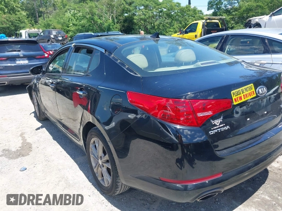 2013 Kia Optima EX z VIN 5XXGN4A75DG171463, wystawiony jako IAAI lot #42324116 z przebiegiem 176 385 mil mil oraz . Historia ofert i sprzedaży dostępna na DreamBid. Obrazek 3.