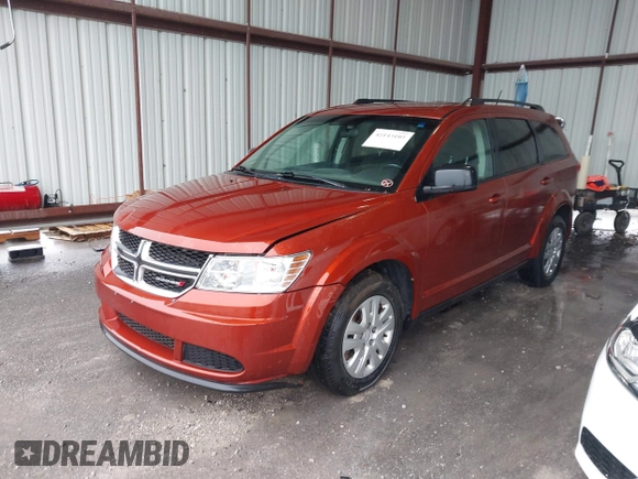 2014 Dodge Journey SE with VIN 3C4PDCAB1ET227003, listed as a IAAI auction lot 42143105 with 212,334 mi miles. Bid and sale history available at carsss.com. Image 2.