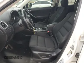 2016 Mazda CX-5 Touring with VIN JM3KE2CY9G0733933, listed as a Copart auction lot 45118885 with 149,901 mi miles and Salvage Title. Bid and sale history available at carsss.com. Image 7.