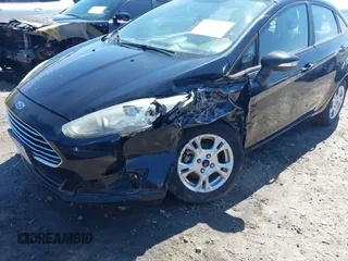 2016 Ford Fiesta SE with VIN 3FADP4BJ9GM144119, listed as a IAAI auction lot 41882179 with 122,048 mi miles. Bid and sale history available at carsss.com. Image 6.