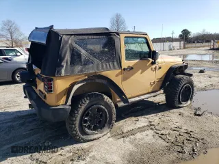 2013 Jeep Wrangler Sport with VIN 1C4AJWAG5DL638636, listed as a Copart auction lot 45197865 with 127,587 mi miles and Salvage title. Bid and sale history available at DreamBid. Image 3.