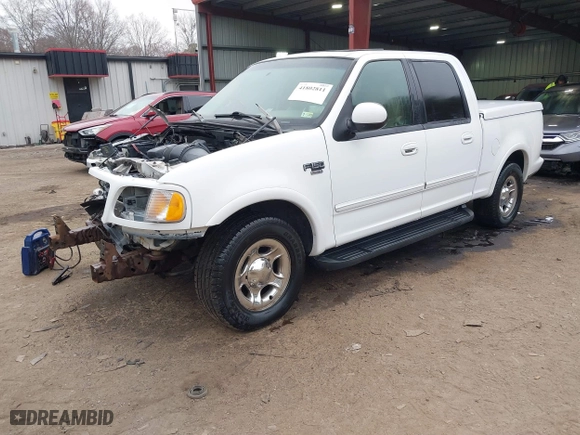2001 Ford F-150 SuperCrew XLT with VIN 1FTRW07LX1KE14432, listed as a IAAI auction lot 41802811 with 192,696 mi miles. Bid and sale history available at carsss.com. Image 18.