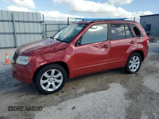2011 Suzuki Grand Vitara Limited z VIN JS3TE0D75B4100095, wystawiony jako Copart lot #44977735 z przebiegiem 95 704 mil mil oraz Szkoda całkowita • Salvage title. Historia ofert i sprzedaży dostępna na DreamBid. Obrazek 1.