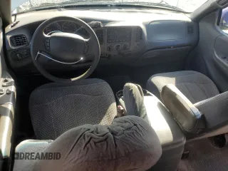1999 Ford F-150 z VIN 1FTRX07WXXKB92796, wystawiony jako Copart lot #48352405 z przebiegiem Nie podano mil oraz Szkoda całkowita • Salvage title. Historia ofert i sprzedaży dostępna na DreamBid. Obrazek 8.