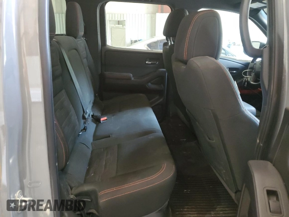 2023 Nissan Frontier Pro-4X z VIN 1N6ED1EK6PN624132, wystawiony jako Copart lot #53797395 z przebiegiem 55 344 mil mil oraz Szkoda całkowita • Salvage title. Historia ofert i sprzedaży dostępna na DreamBid. Obrazek 10.