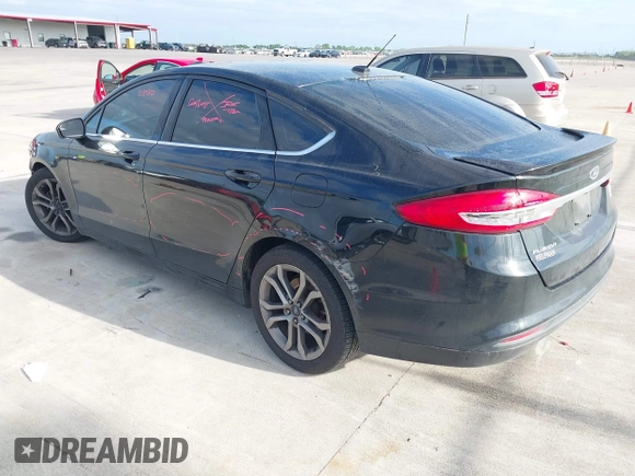 2017 Ford Fusion S with VIN 3FA6P0G75HR353909, listed as a IAAI auction lot 42024272 with 151,383 mi miles. Bid and sale history available at carsss.com. Image 3.