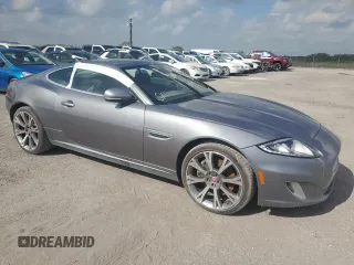 2014 Jaguar XK with VIN SAJWA4FB6ELB54004, listed as a Copart auction lot 51874435 with 0 mi miles and Non Repairable. Bid and sale history available at carsss.com. Image 4.