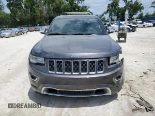 2014 Jeep Grand Cherokee Overland with VIN 1C4RJFCT7EC182234, listed as a Copart auction lot 54754465 with 185,658 mi miles and Salvage Title. Bid and sale history available at DreamBid. Image 5.